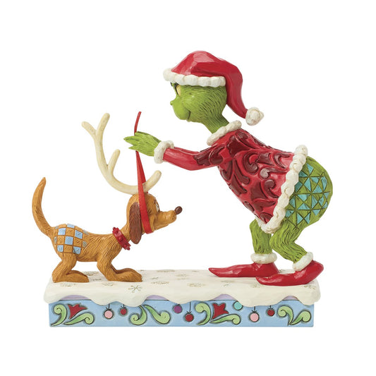 GRINCH TYING ANTLERS